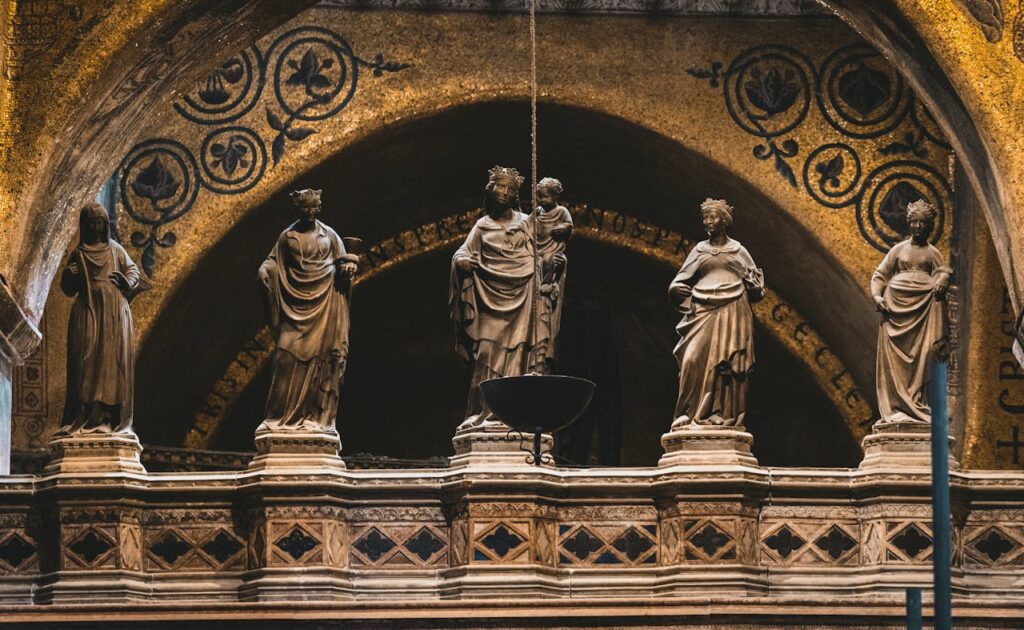 Beautifully detailed sculptures inside an Italian cathedral display Renaissance artistry and religious symbolism.