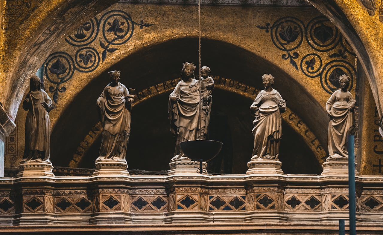 Beautifully detailed sculptures inside an Italian cathedral display Renaissance artistry and religious symbolism.